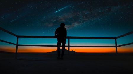 Geminid meteor shower 2023: A man looking at meteors in the sky.
