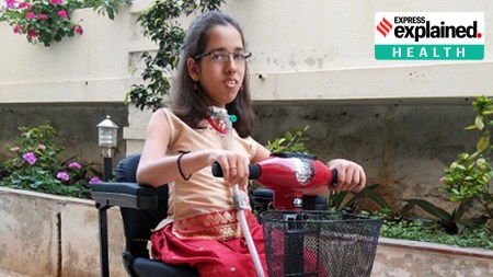 Nidhi Shirol on a wheelchair-like device.