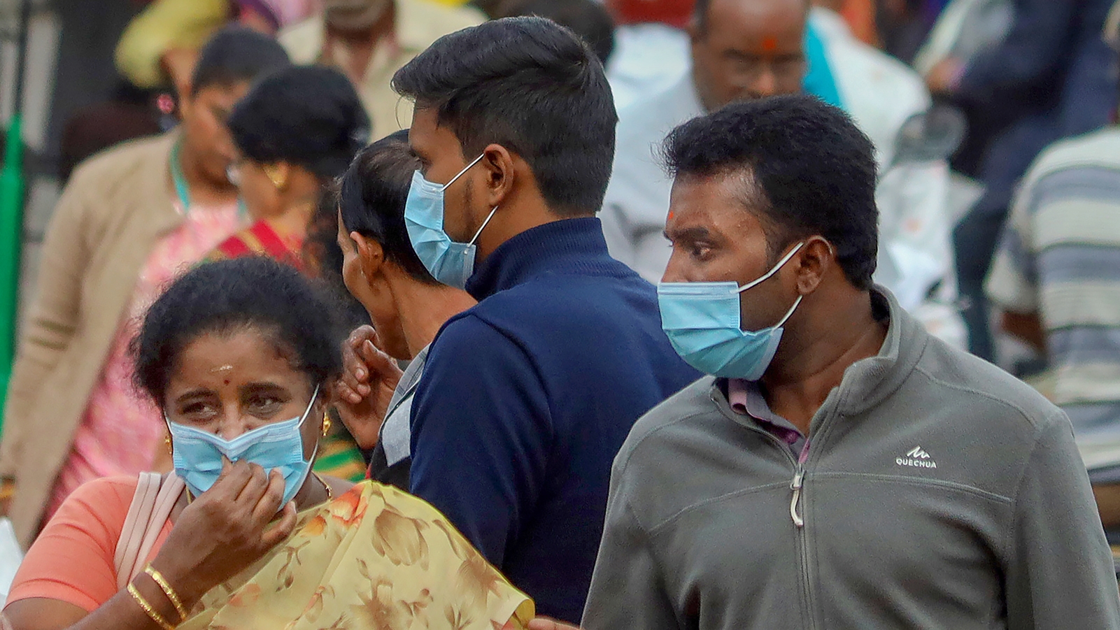 https://images.indianexpress.com/2023/12/People-wear-masks-in-Bengaluru-on-Wednesday-amid-a-rise-in-the-number-of-Covid-19-cases-across-the-country.-PTI.jpg