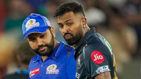  Mumbai Indians’ then captain Rohit Sharma and Gujarat Titans’ then captain Hardik Pandya during the IPL 2023 T20 cricket match, in Ahmedabad. (PTI)