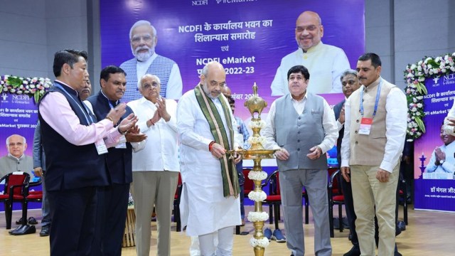 Amit Shah, Shahs pitch for cooperation between cooperatives, BJP pilot programme, Banaskantha dairy association, digital payment mode, National Dairy Development Board, indian express news
