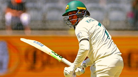 Usman Khawaja of Australia bats on the first day of the first cricket test between Australia and Pakistan in Perth, Australia.