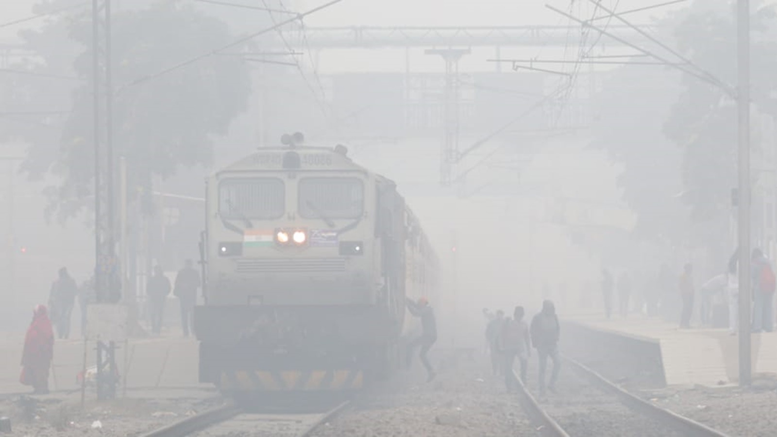 Train services were disrupted by dense fog and smog in Delhi. (Express photo by Praveen Khanna)