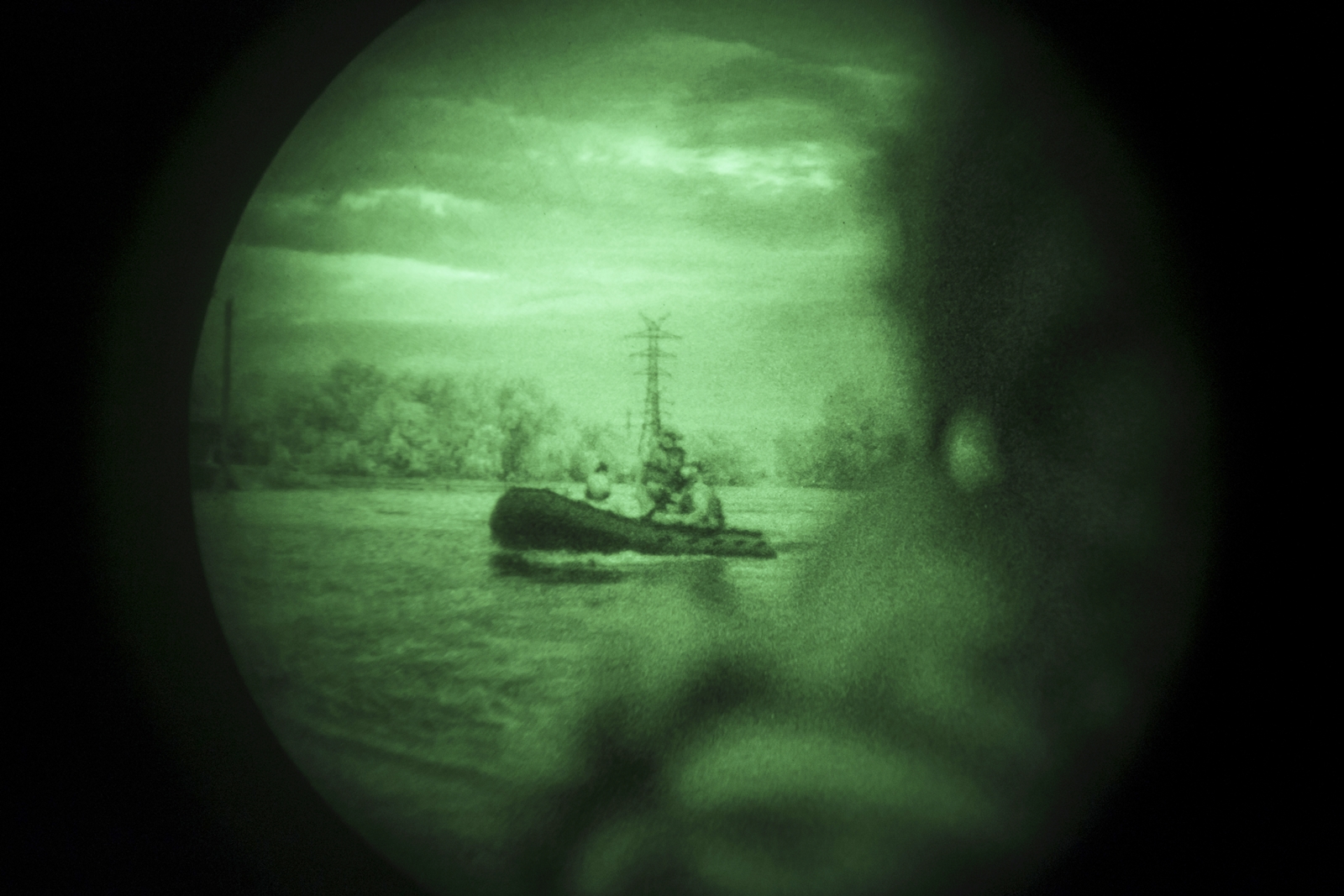Ukraine Special Operations Forces soldiers navigate the Dnipro River using night vision goggles, or NVG, during a night mission in Kherson region, Ukraine, Sunday, June 11, 2023. (AP Photo/Felipe Dana)