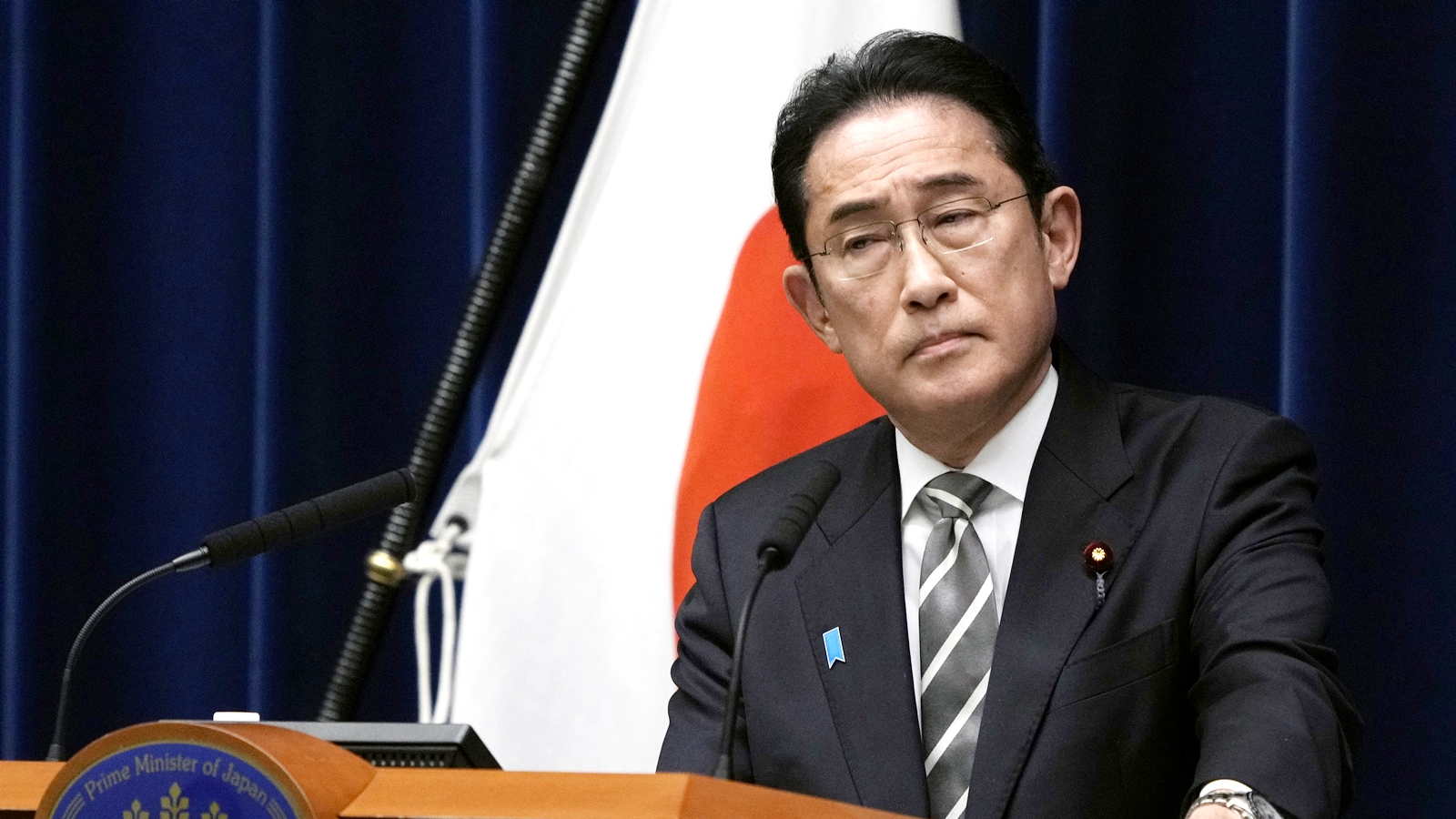 japan-pm-overhauls-cabinet-in-bid-to-weather-financial-scandal-world