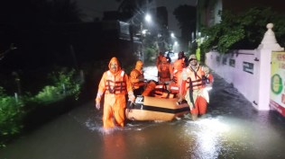 In this photo shared by NDRF on the social media platform X, rescuers are seen evacuating people in low-lying areas of Tambaram, Tamil Nadu.