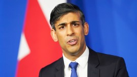 Britain's Prime Minister Rishi Sunak gives an update on the plan to "stop the boats" and illegal migration during a press conference in the Downing Street Briefing Room in London, Thursday Dec. 7, 2023. (James Manning/Pool via AP)