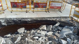 This photo shared by Ulsoor Traffic Police on X shows the collapsed portion of the road in Bengaluru.