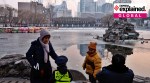 Elderly people spend time with children at a park in Beijing, China January 12, 2024.