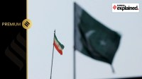 The flag of Iran is seen over its consulate building, with Pakistan's flag in the foreground, after the Pakistani foreign ministry said the country conducted strikes inside Iran targeting separatist militants, two days after Tehran said it attacked Israel-linked militant bases inside Pakistani territory, in Karachi, Pakistan January 18, 2024.