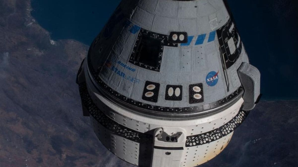 Boeing’s CST-100 Starliner crew ship is pictured docked to the International Space Station during an uncrewed flight test.