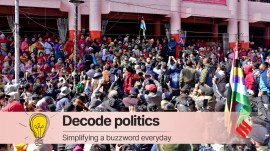 Supporters of Korounganba Khuman listen to him speaking, after he met with the state lawmakers in Imphal
