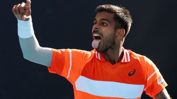 Sumit Nagal of India celebrates after defeating Alexander Bublik of Kazakhstan in their first round match at the Australian Open tennis championships at Melbourne Park, Melbourne, Australia. (AP | PTI)