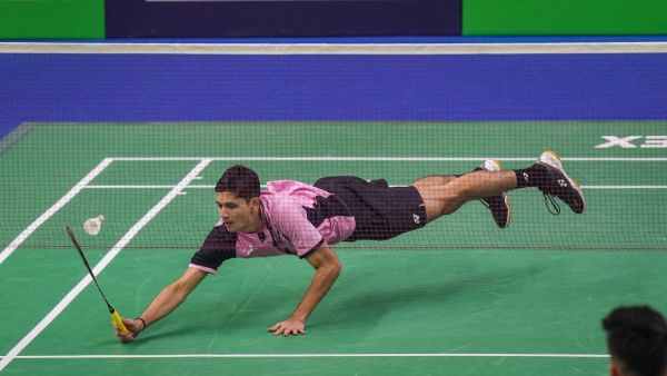 India's Priyanshu Rajawat returns a shot during the men's singles Round of 32 badminton match against compatriot Lakshya Sen at the Yonex Sunrise India Open 2024, in New Delhi. (PTI)