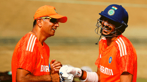 India's Axar Patel and coach Rahul Dravid during practice REUTERS