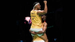 India's Satwiksairaj Rankireddy, right and Chirag Shetty celebrate after defeating South Korea's Kang Min Hyuk and Seo Seung Jae in the men's doubles badminton semifinal match the Malaysia Open badminton tournament at Bukit Jalil Axiata Arena in Kuala Lumpur, Malaysia, Saturday, Jan. 13, 2024. (AP Photo)
