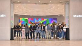 Samsung CEO for Southeast Asia inaugurating the store with other executives. (Vivek umashankar / Express photo)