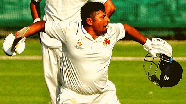 Mumbai's Sarfaraz Khan celebrates after scoring century during Ranji trophy match between Saurashtra and Mumbai at Narendra Modi stadium in Ahmedabad on Thursday. Express photo by Nirmal Harindran