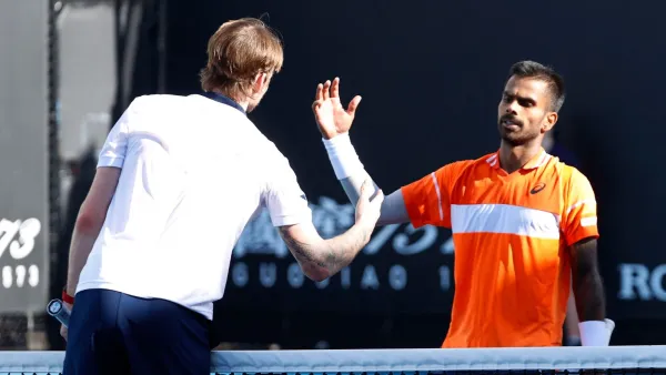India's Sumit Nagal shakes hands with Kazakhstan's Alexander Bublik after winning his first round match. (Reuters)