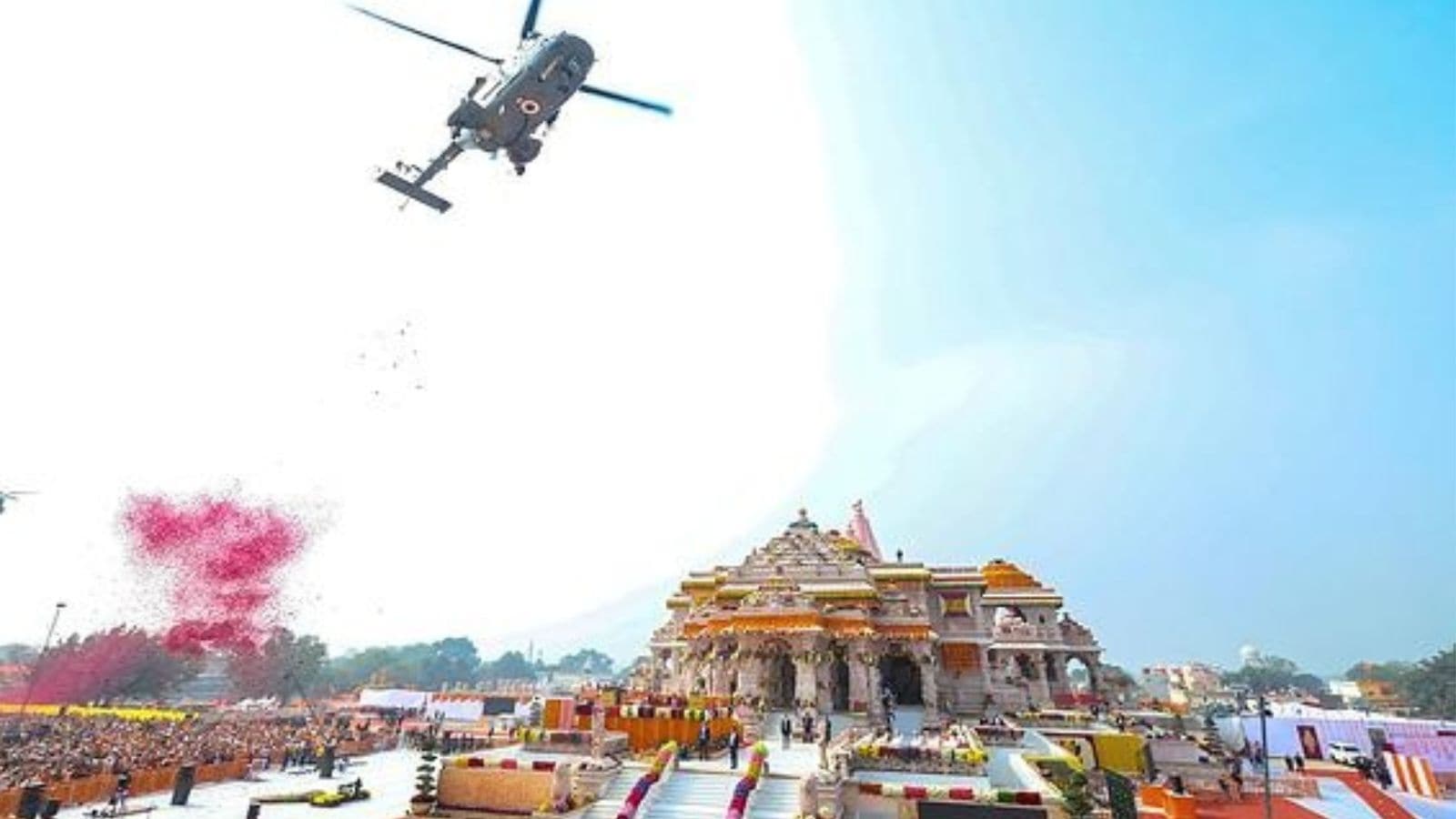 A helicopter showers flowers during the Ram Mandir Pran Pratishtha ceremony in Ayodhya.