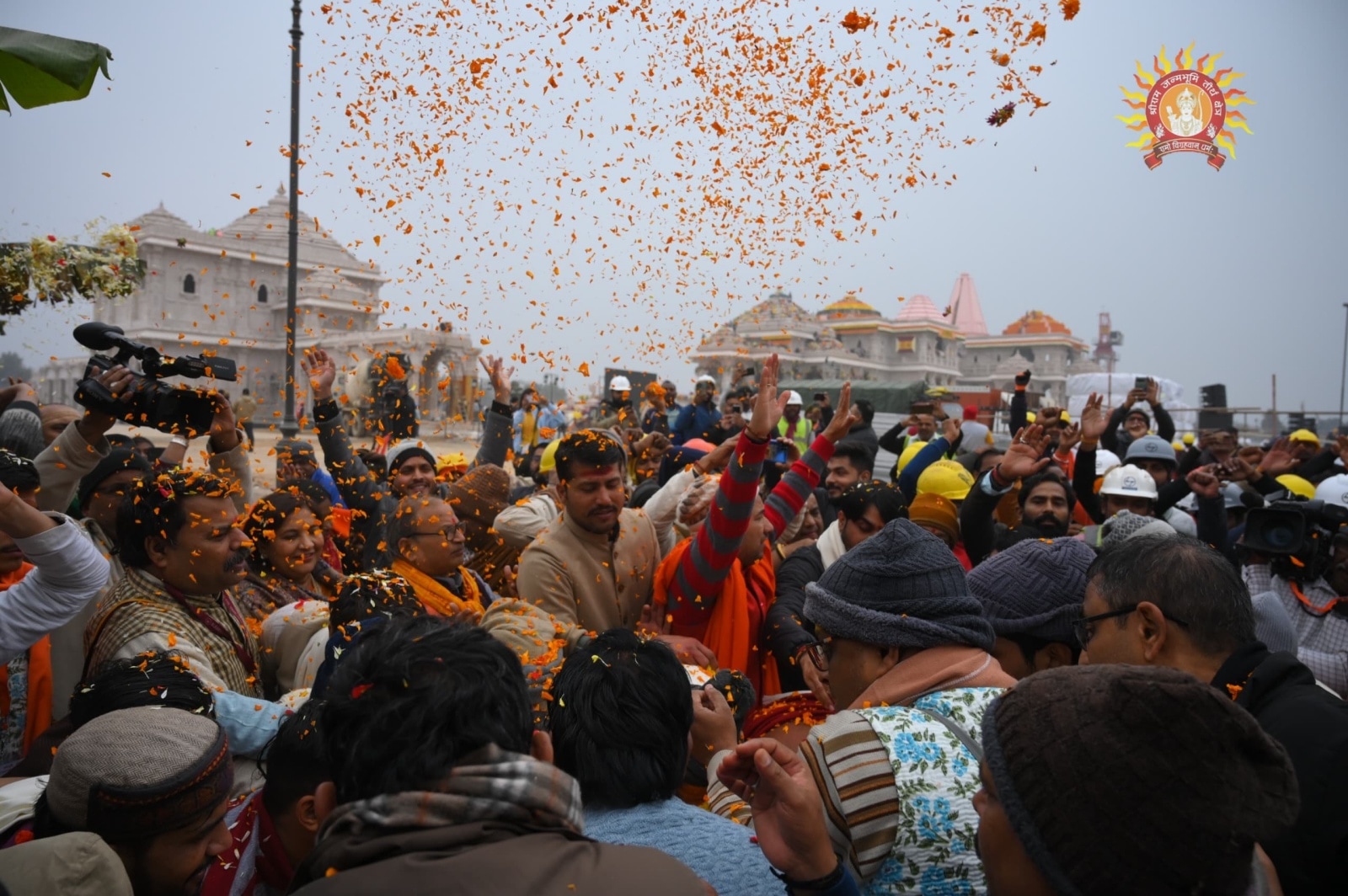 Devotees during the performance of daily puja, 'havan' and 'parayana' in the pavilion ahead of the consecration ceremony of Ram Temple, in Ayodhya,