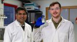 Sudhagar Pitchaimuthu (left) and PhD student Michael Walsh with a sample of whisky distillery wastewater.