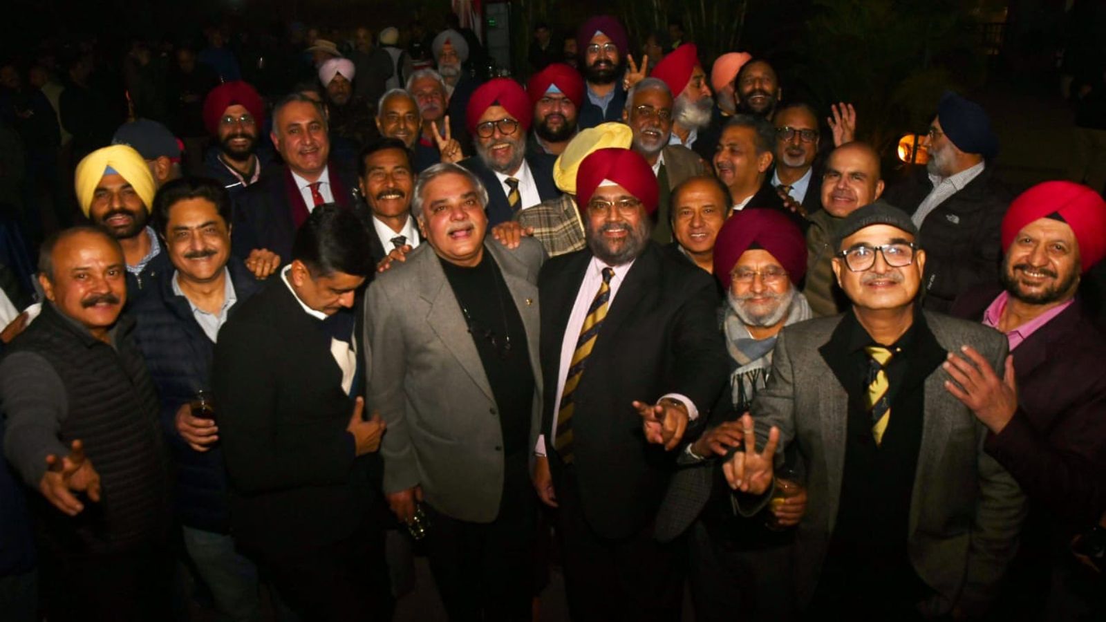 New Chandigarh Golf Club president Ravibir Singh Grewal (in centre in red turban and in front) with his team after the results on Sunday. Kamleshwar Singh
