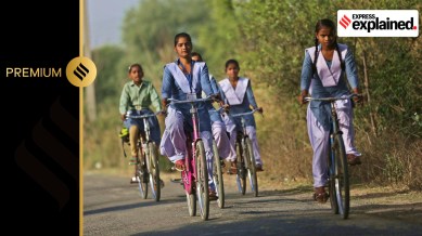 Young girls cycle to high school from their village in Mallaka in Fatehpur, Uttar Pradesh.