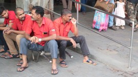 Mumbai coolie, Mumbai coolie life, Mumbai railway stations, amenities at Mumbai railway stations, Mumbai coolie news, railway stations icons, amenities for passengers improve, Mumbai LTT, 1983 Bollywood blockbuster Coolie, Amitabh Bachchan, indian express news