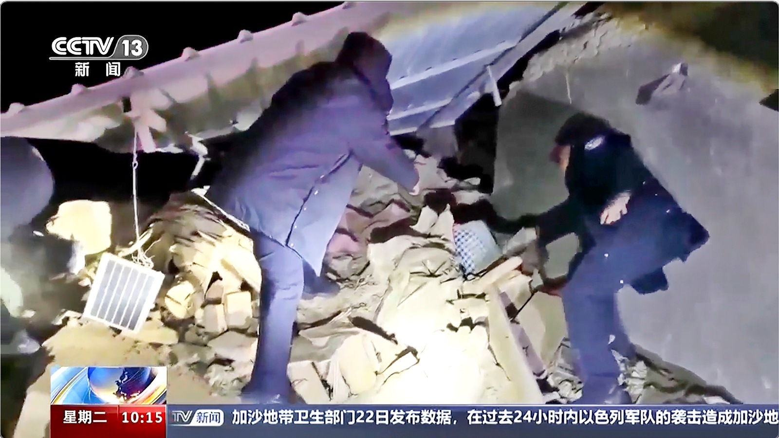 In this image taken from video footage run by China's CCTV, rescuers work near the rubble from an earthquake in Kizilsu Kirghiz Autonomous Prefecture, China's western Xinjiang region, Jan. 23, 2024. (AP/PTI)