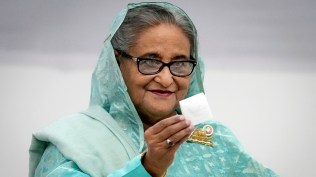 Bangladesh Prime Minister Sheikh Hasina shows her ballot paper as she casts her vote in Dhaka, Bangladesh, Jan. 7, 2024. (AP/PTI)
