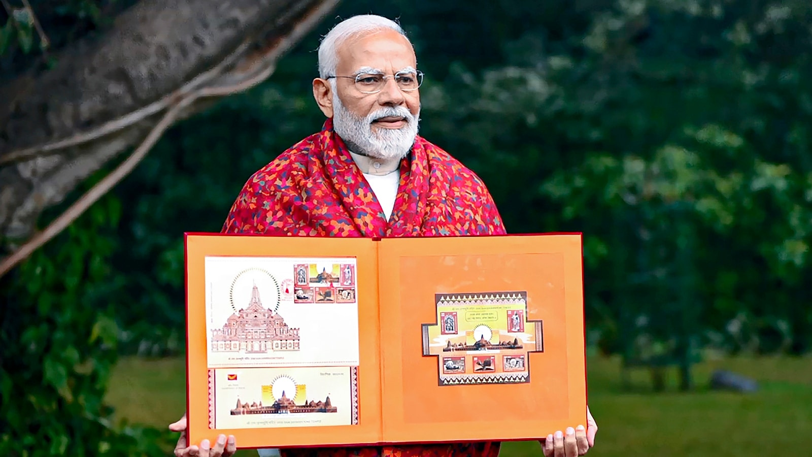 Prime Minister Narendra Modi releases commemorative postage stamps on Shri Ram Janmabhoomi Temple and a book of stamps issued on Lord Ram around the world, in Ayodhya, Jan. 18, 2024. (PTI)