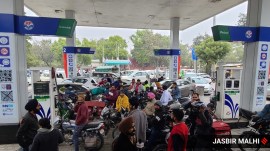 Vehicle users queue outside a petrol pump in Landran road, Mohali on Tuesday. (Express photo by Jasbir Malhi)