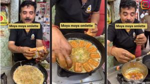 street food vendor making omelette with Parle-G biscuits