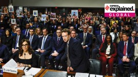 Meta's CEO Mark Zuckerberg returns to his seat after standing and facing the audience while he testified during the Senate Judiciary Committee hearing on online child sexual exploitation at the U.S. Capitol in Washington, U.S., January 31, 2024.