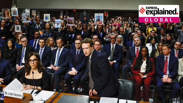 Meta's CEO Mark Zuckerberg returns to his seat after standing and facing the audience while he testified during the Senate Judiciary Committee hearing on online child sexual exploitation at the U.S. Capitol in Washington, U.S., January 31, 2024.