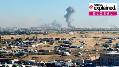Smoke rises during an Israeli ground operation in Khan Younis, amid the ongoing conflict between Israel and the Palestinian Islamist group Hamas, as seen from a tent camp sheltering displaced Palestinians in Rafah, in the southern Gaza Strip February 11, 2024.