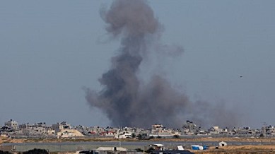 Smoke rises during an Israeli ground operation in Khan Younis, as seen from Rafah