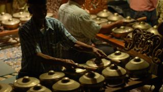 A man playing the Javanese instrument Banong. (Andrew Otto)