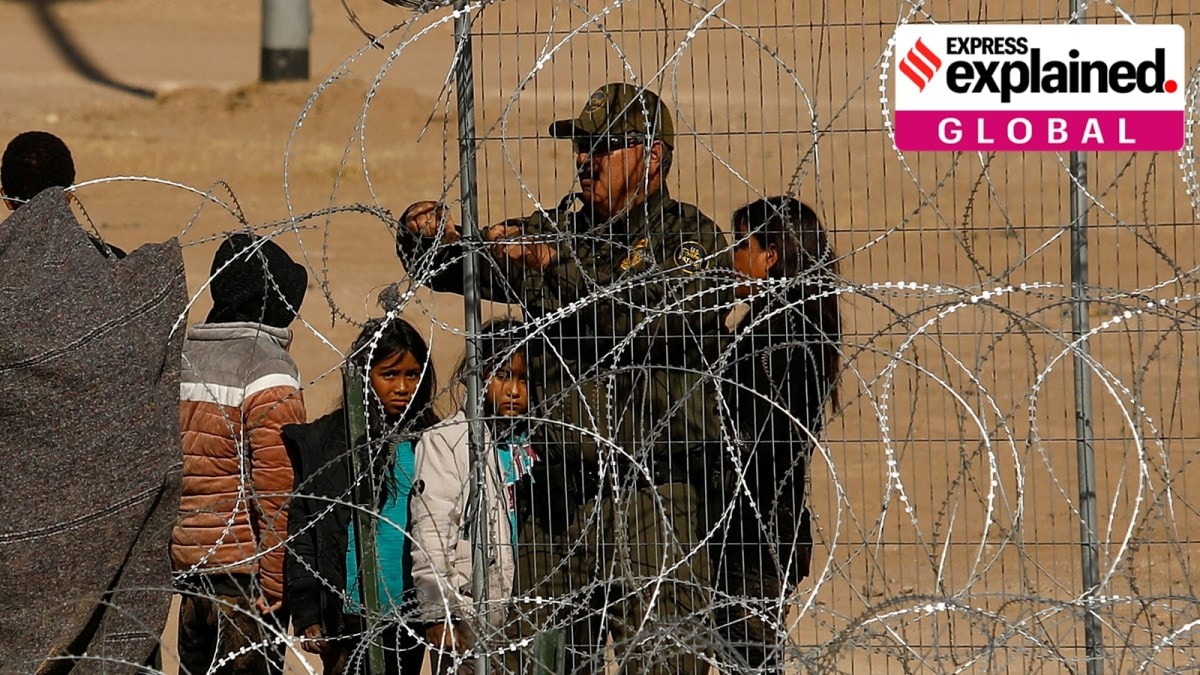 FILE PHOTO: Migrants try to reach the United States from Mexico, in Ciudad Juarez