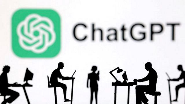 Figurines with computers and smartphones are seen in front of ChatGPT logo in this illustration taken, February 19, 2024. REUTERS/Dado Ruvic/Illustration