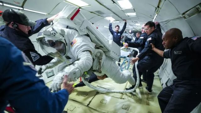 Collins Aerospace's chief test astronaut John Olivas is seen here performing tasks wearing the spacesuit.