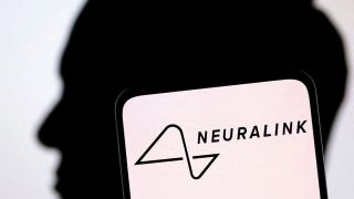 Neuralink logo and Elon Musk silhouette are seen in this illustration taken, December 19, 2022. REUTERS/Dado Ruvic/Illustration/File Photo