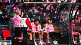 Inter Miami's Lionel Messi looks on from the bench during the friendly soccer match between the Hong Kong team and US Inter Miami CF at the Hong Kong Stadium in Hong Kong, Sunday, Feb. 4, 2024. AP/PTI