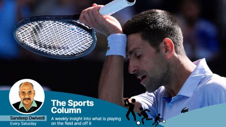 Novak Djokovic of Serbia wipes the sweat from his face during his semifinal against Jannik Sinner of Italy at the Australian Open tennis championships at Melbourne Park, Melbourne, Australia. (AP | PTI)