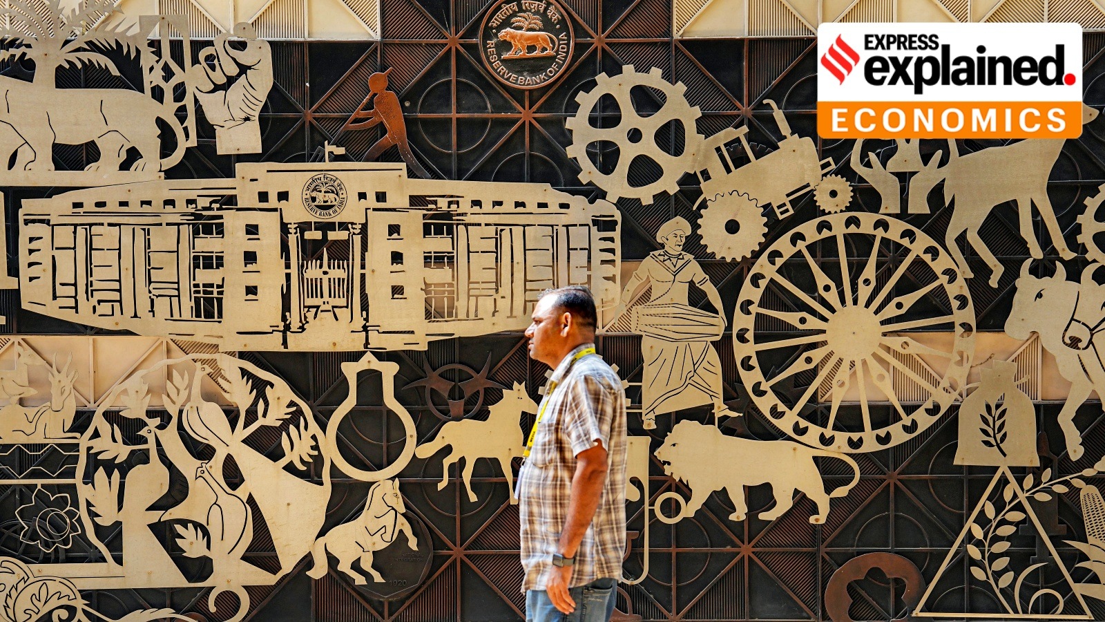 Mumbai: A man walks past the Reserve Bank of India (RBI) headquarters in Mumbai, Thursday, Feb. 8, 2024.