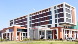 Narendra Modi, PM Modi inaugurates Rajkot AIIMS, PM Modi Gujarat visit, Rajkot AIIMS patient capacity, Rajkot AIIMS opd, Rajkot AIIMS number of beds, indian express news
