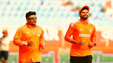 India's Shreyas Iyer and Sarfaraz Khan before the start of the second Test cricket match between India and England, at Dr Y S Rajasekhara Reddy ACA-VDCA Cricket Stadium in Visakhapatnam, Friday, Feb. 2, 2024. (PTI Photo