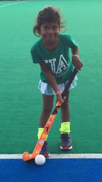 Saumya Escarré playing hockey in in Alicante, Spain.  (Photo credit: Juan Escarré)