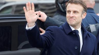 Save the date: Macron says he'll swim in River Seine as he inspects Paris' new Olympic village